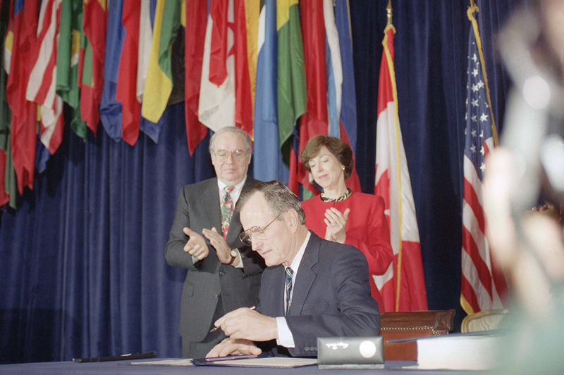 Then-president George Bush signs NAFTA. Photo: AP